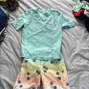 OshKosh boys swim trunks and rashguard. Size 6